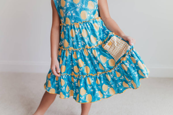 Teal Lemon Pocket Bow Ruffle Dress