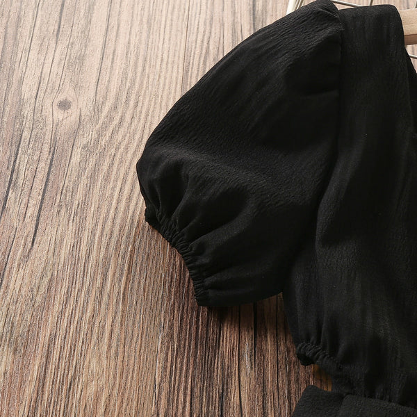 The Avren Cut-Out Dress in Black