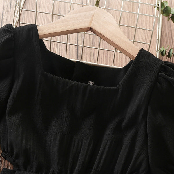 The Avren Cut-Out Dress in Black
