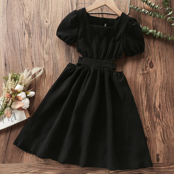 The Avren Cut-Out Dress in Black