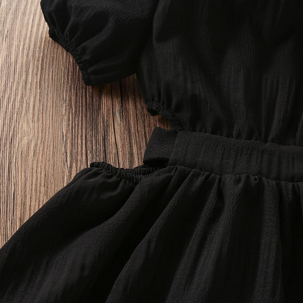 The Avren Cut-Out Dress in Black